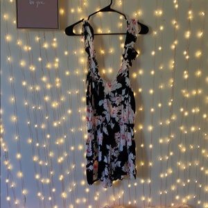 Black and pink floral print romper